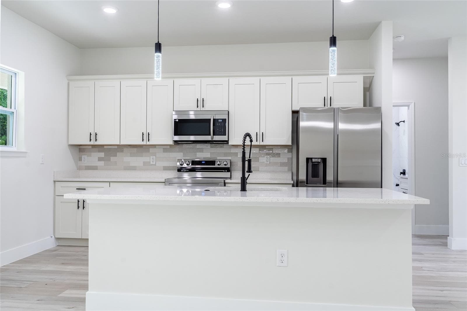 lots of wall cabinet space - 7872 N KEYSTONE DR, CITRUS SPRINGS