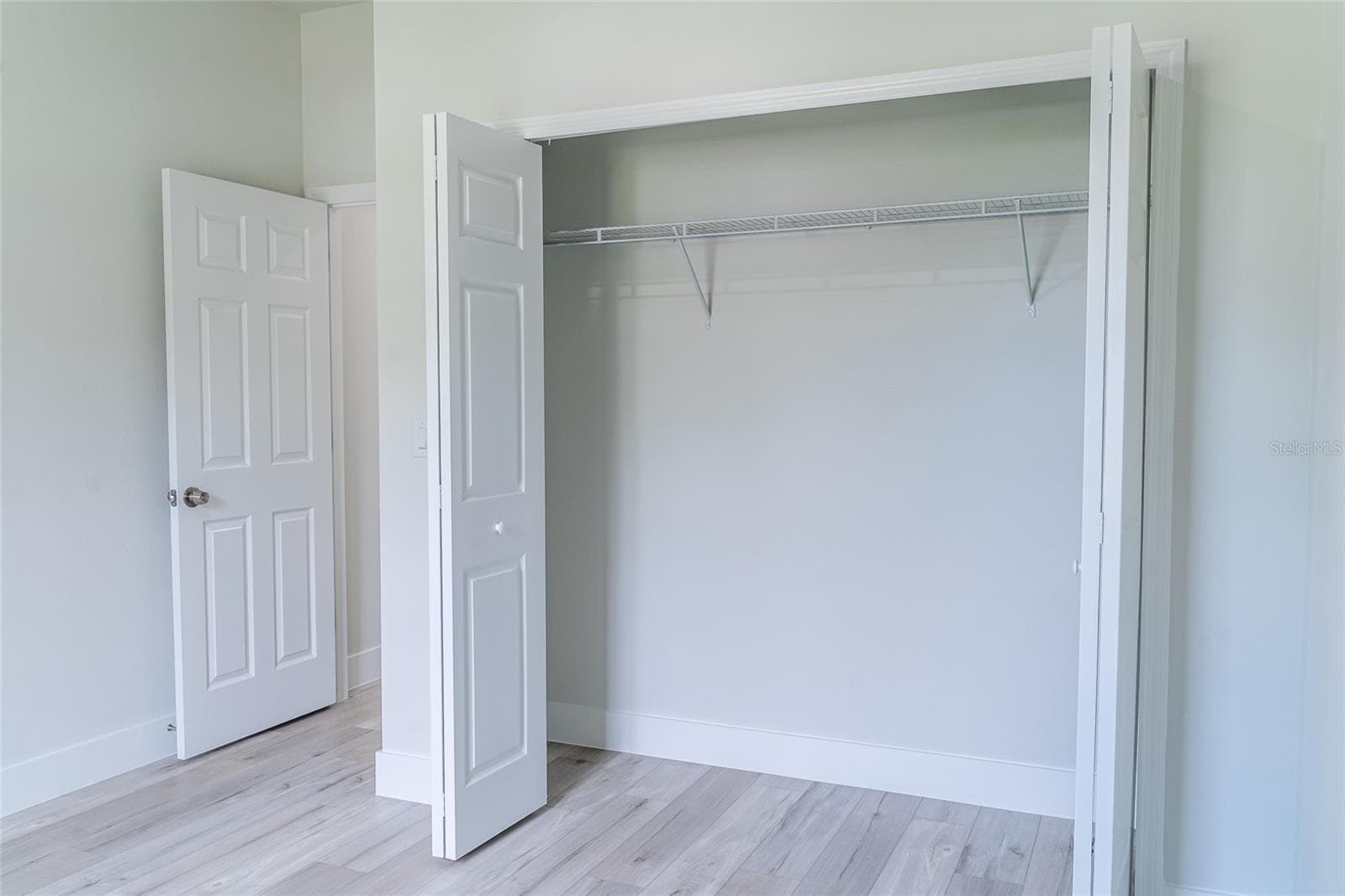 bedroom 2 closet - 7872 N KEYSTONE DR, CITRUS SPRINGS