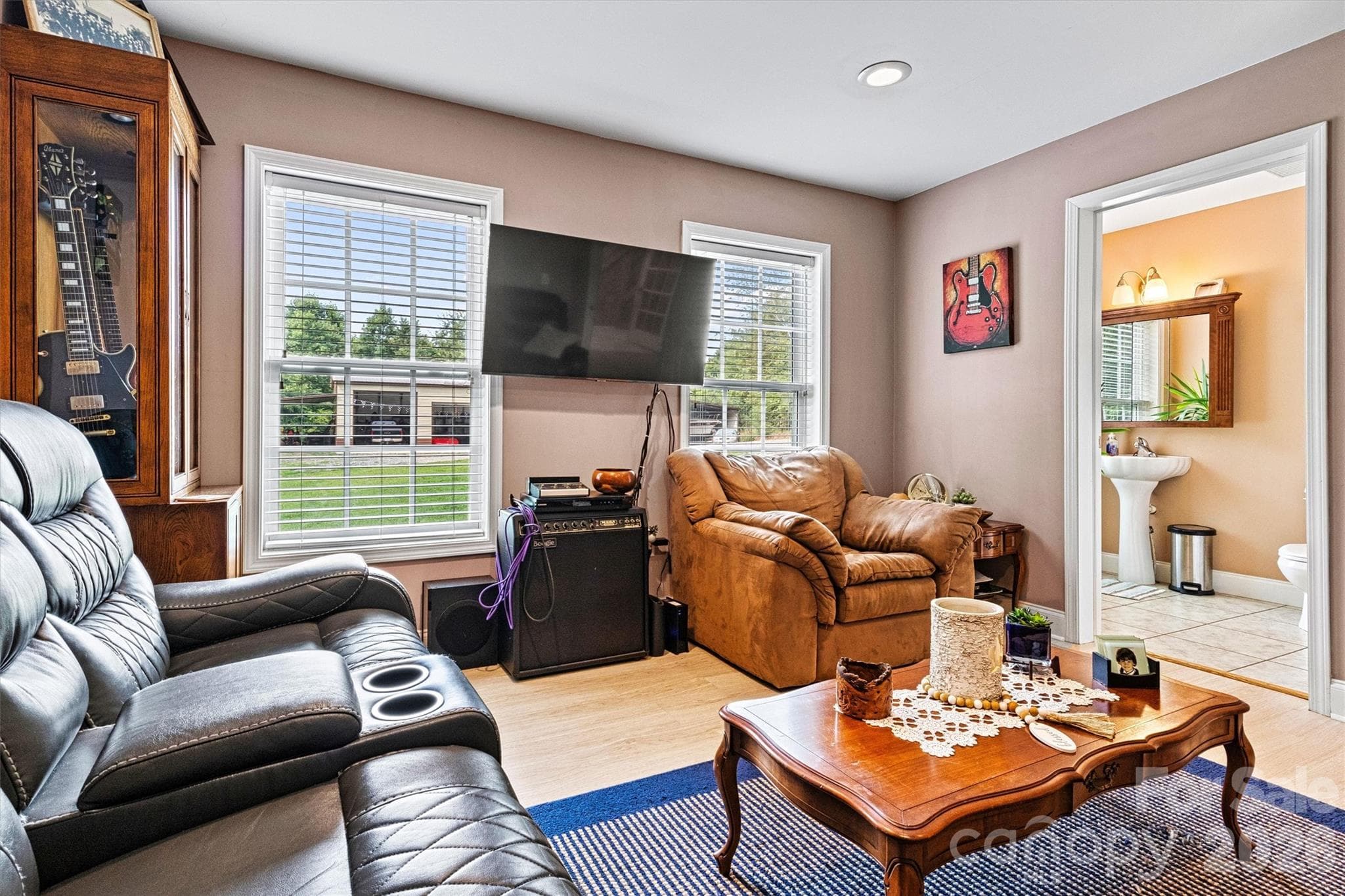 downstairs bedroom - Primary Suite - with ensuite half bath - 6051 Pointe West Lane, Vale
