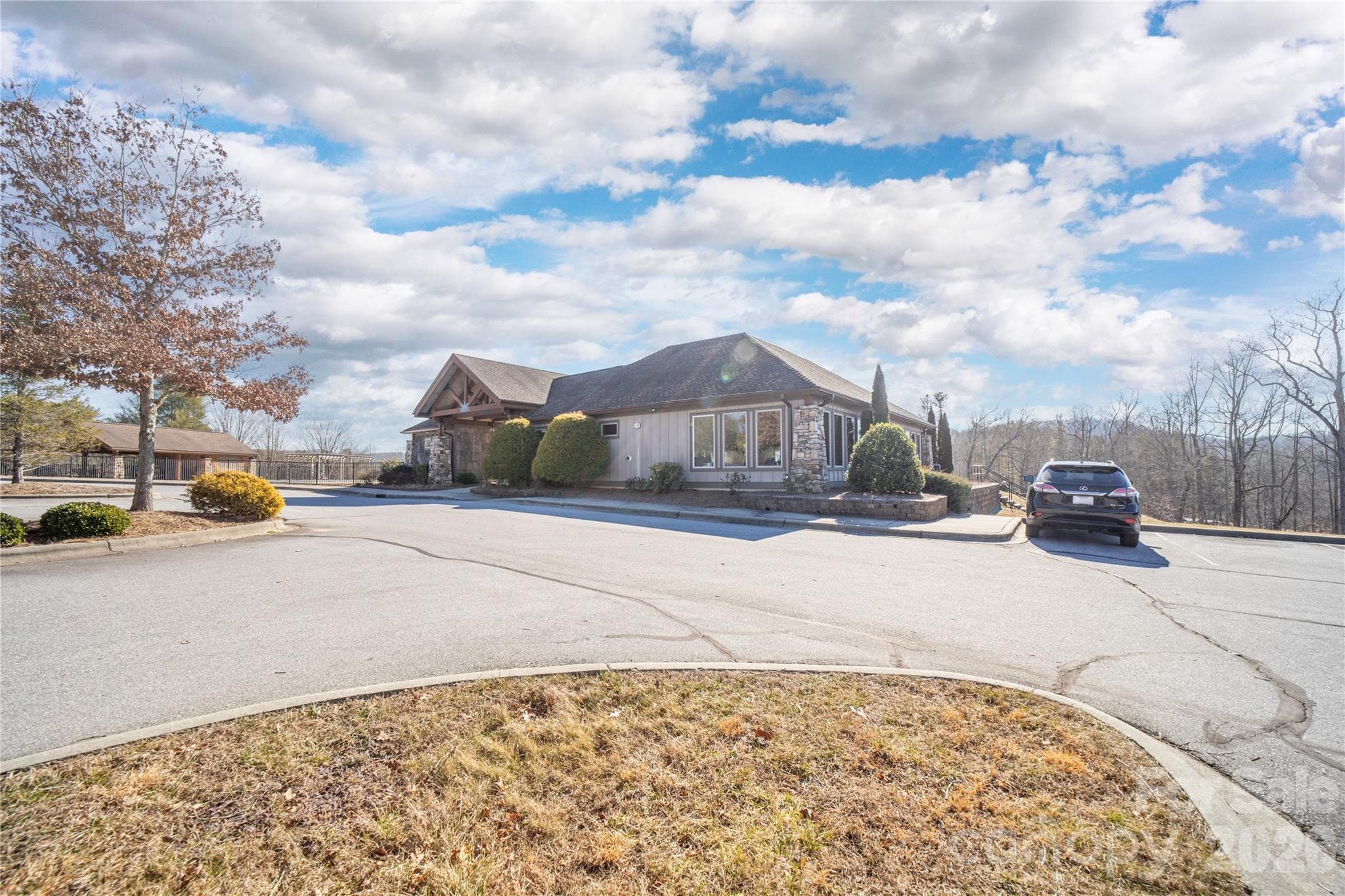 Fitness center located adjacent to the pool and tennis courts. - Hendersonville