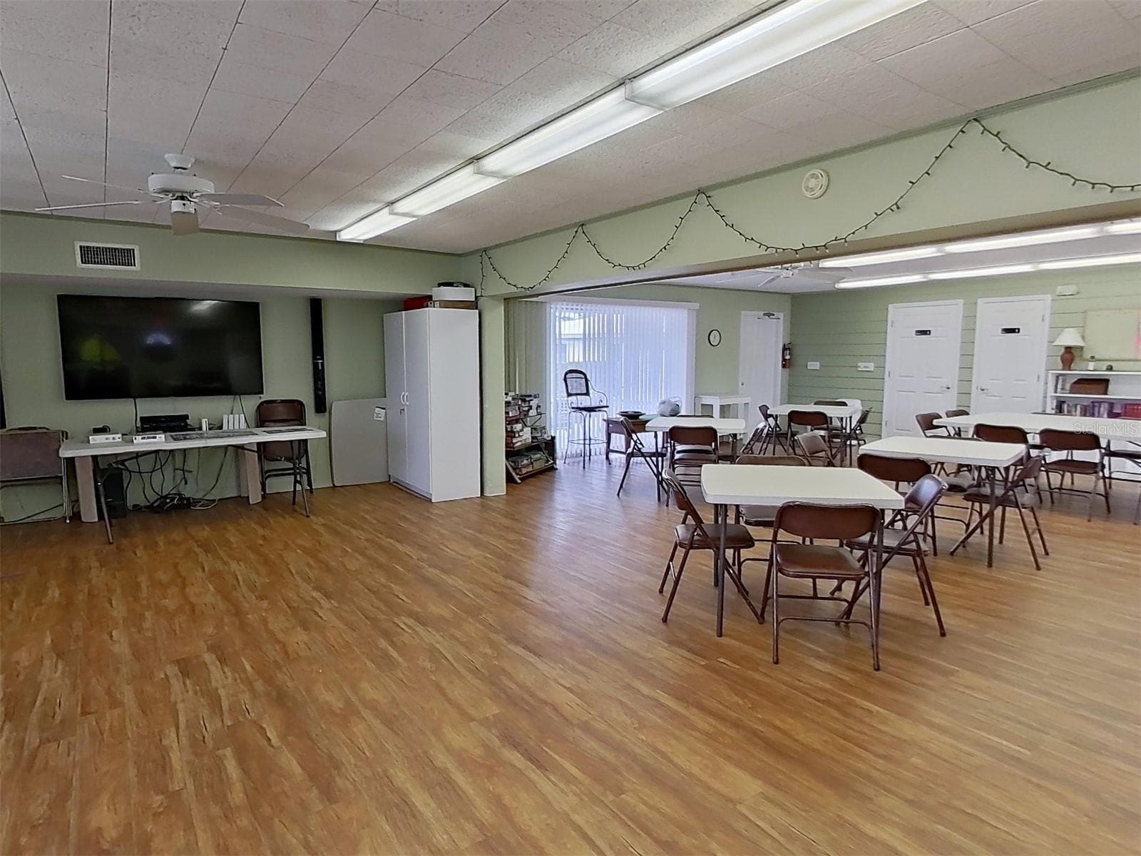 Large tv provided in the clubhouse for fun or meetings. - 1845 VERA PL #29, SARASOTA