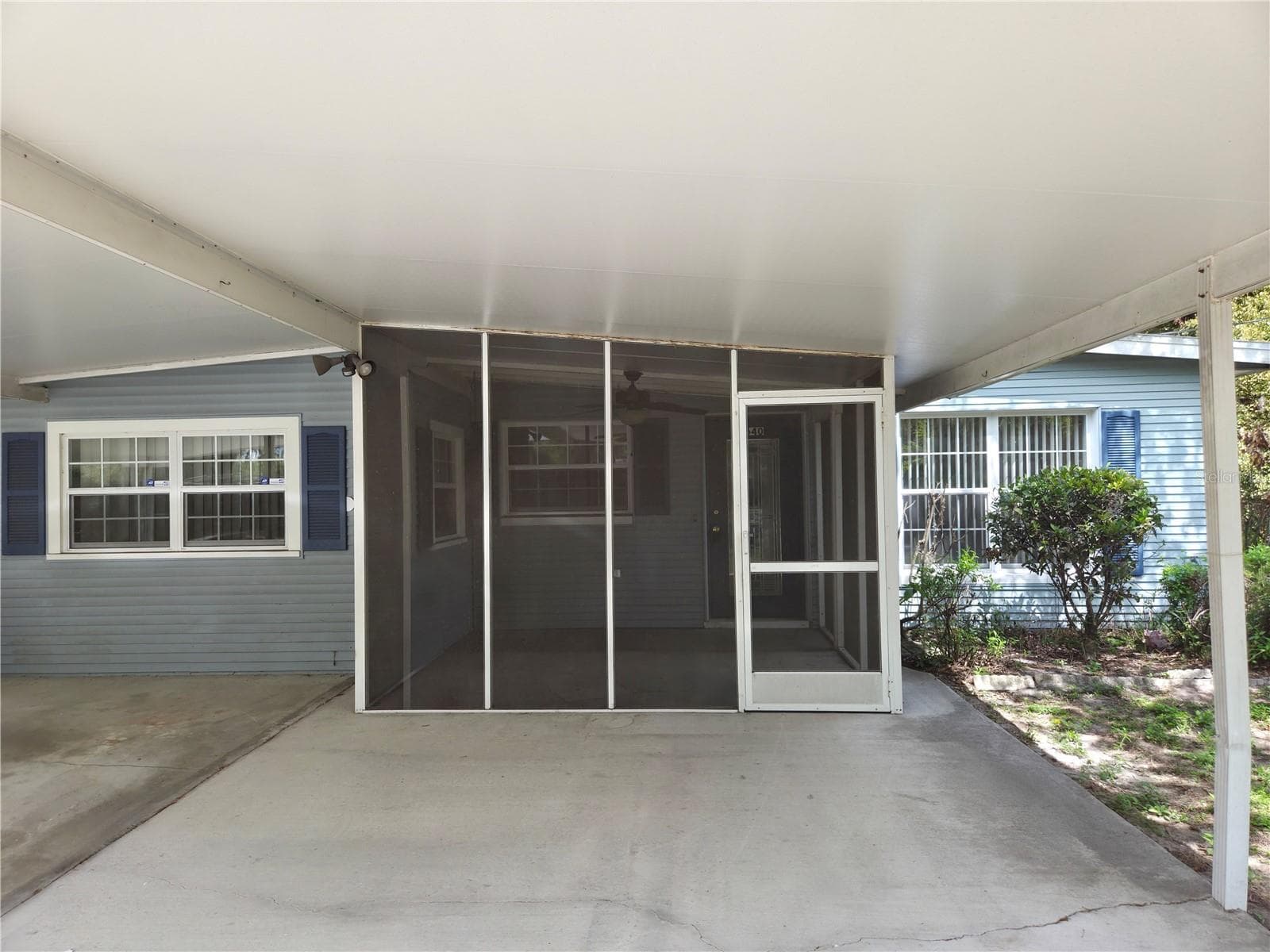 Screened front porch - 640 FORREST DR, BARTOW