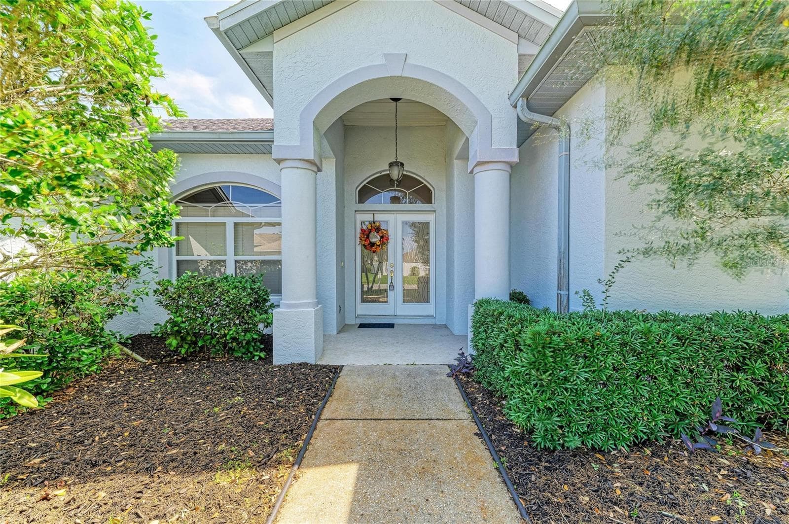Covered entrance with double doors for easy move-in - 7604 52ND TER E, BRADENTON