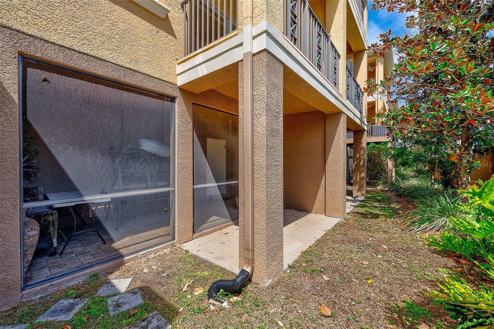 1ST LEVEL COVERED PATIO & SCREEN LANAI - 6518 SAND SHORE LN, NEW PORT RICHEY