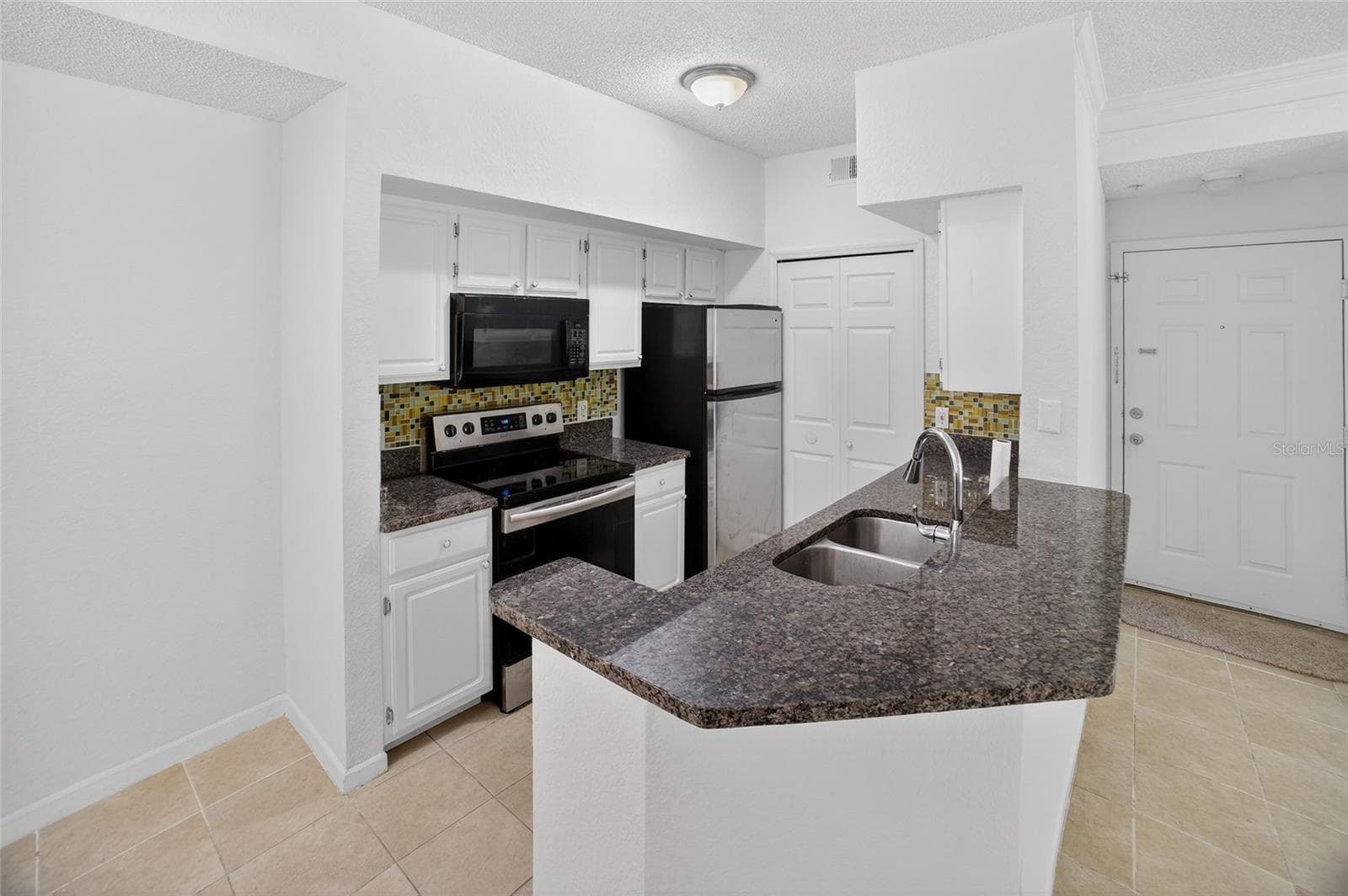 Condominium at 13003 PLANTATION PARK CIR #1323, ORLANDO, photo 2 of 38
