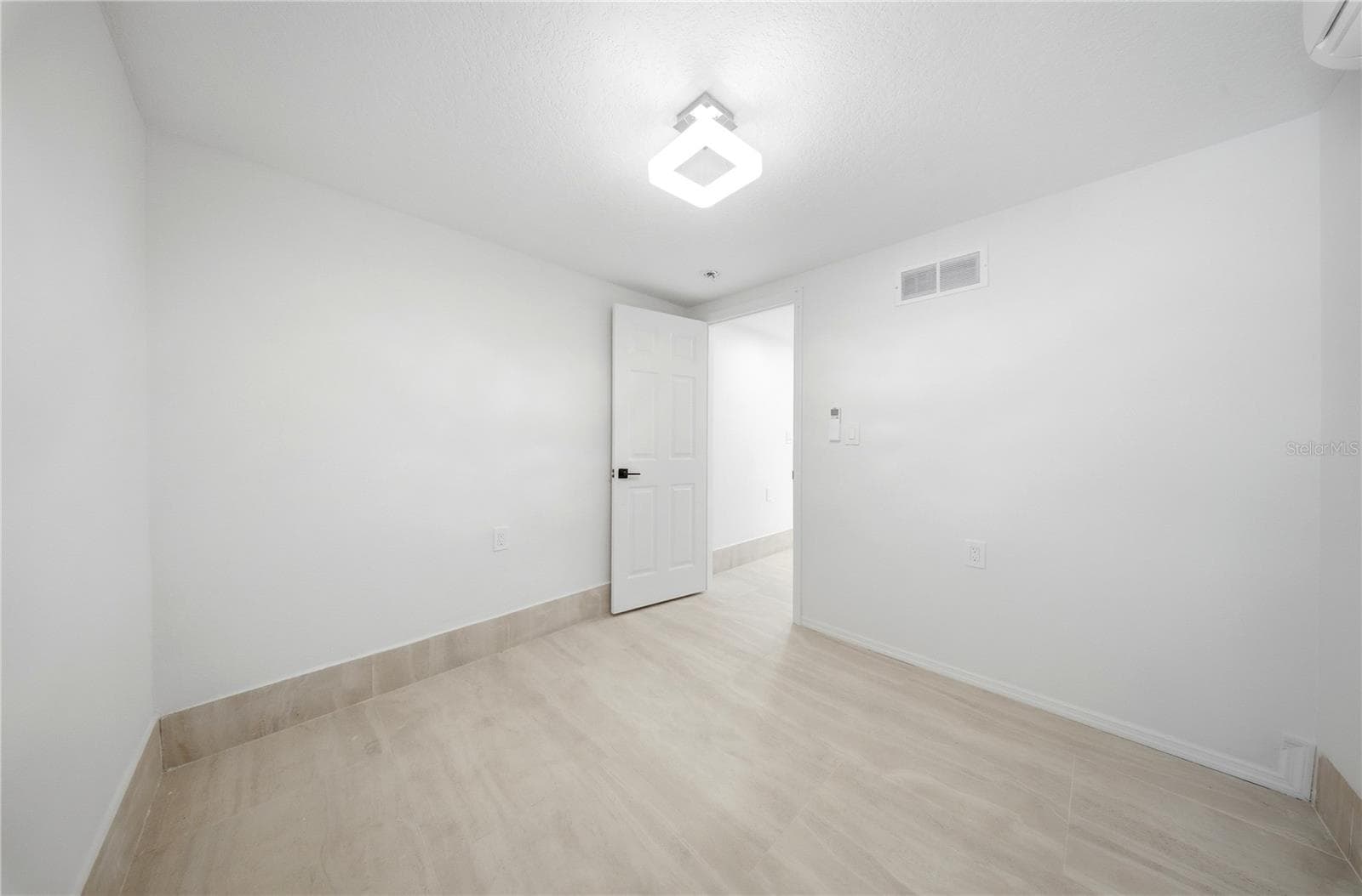 1st Floor - Bedroom 3 Staged - 1109 CHARLES ST, CLEARWATER