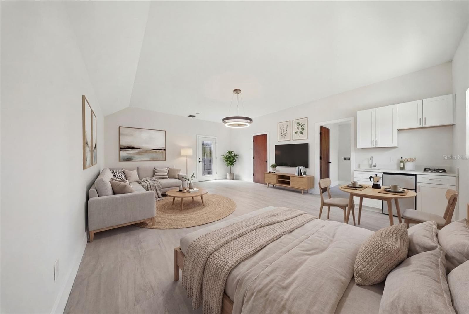 Primary Bedroom Staged As Multi-Family Studio - 1109 CHARLES ST, CLEARWATER