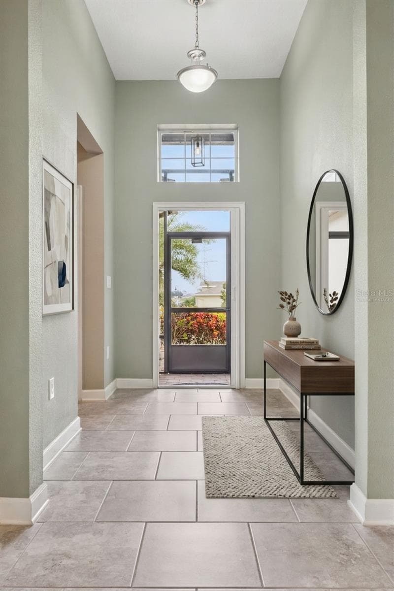 Virtually staged foyer - 3464 EMBERS LN, CLERMONT