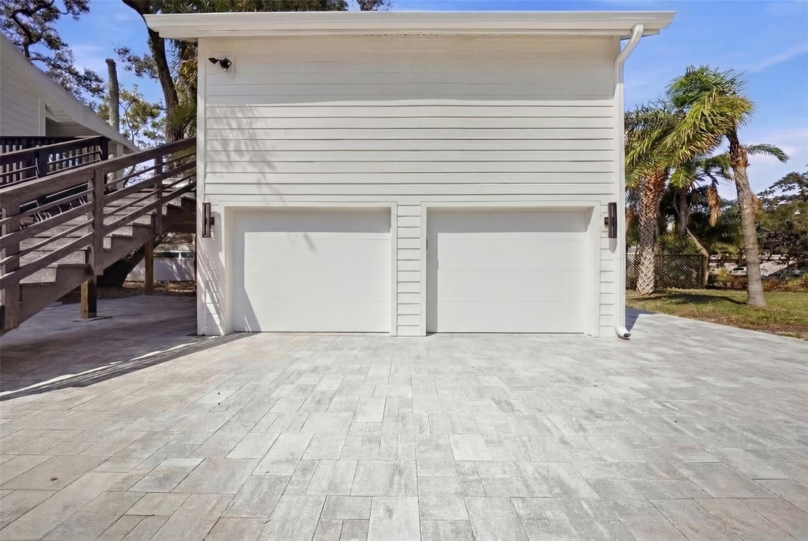 Staged. Impact rated garage doors will be installed before closing - 1109 CHARLES ST, CLEARWATER