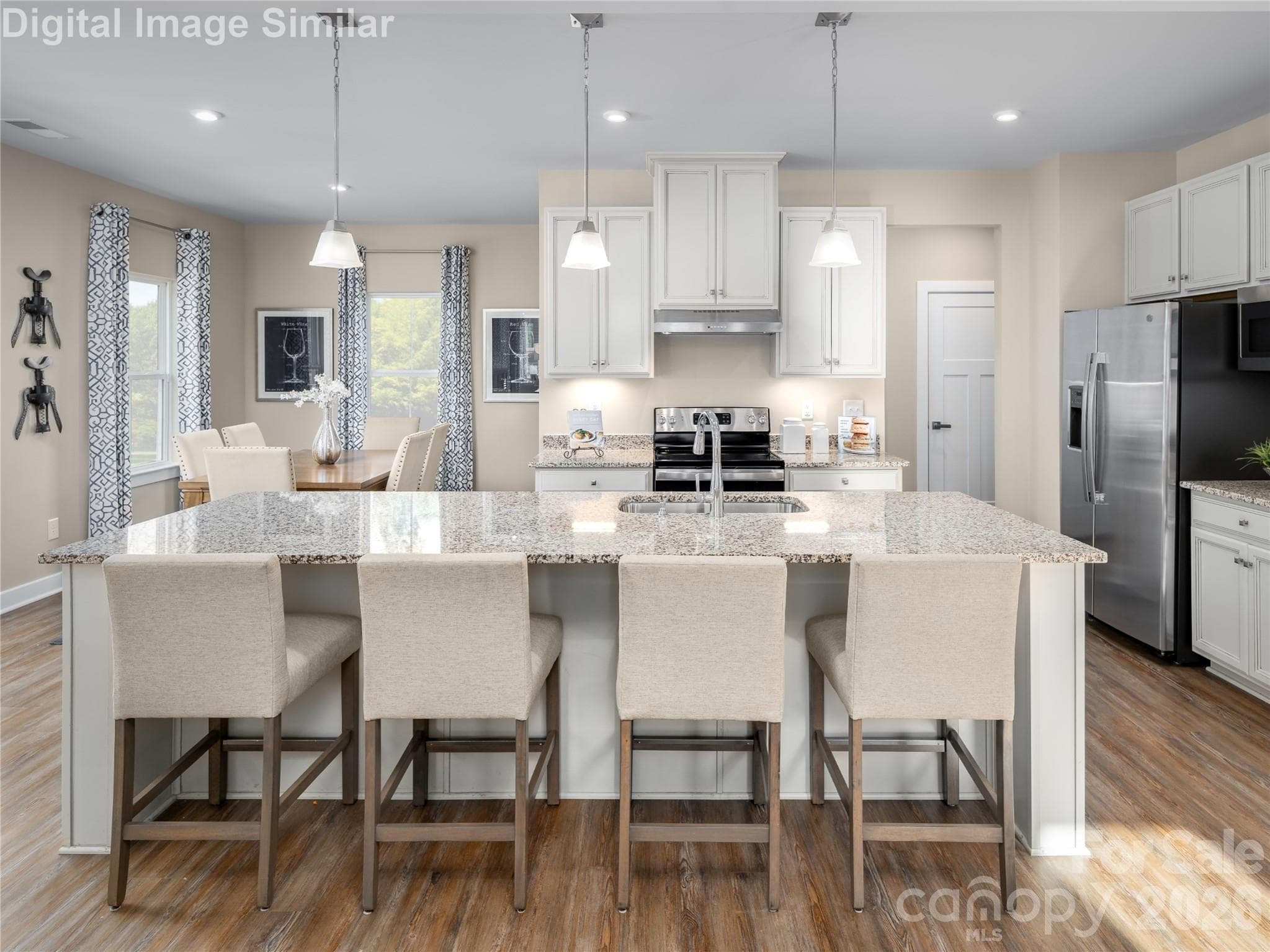 A cozy kitchen that packs a punch — style, warmth, and everything you need to entertain. - Charlotte