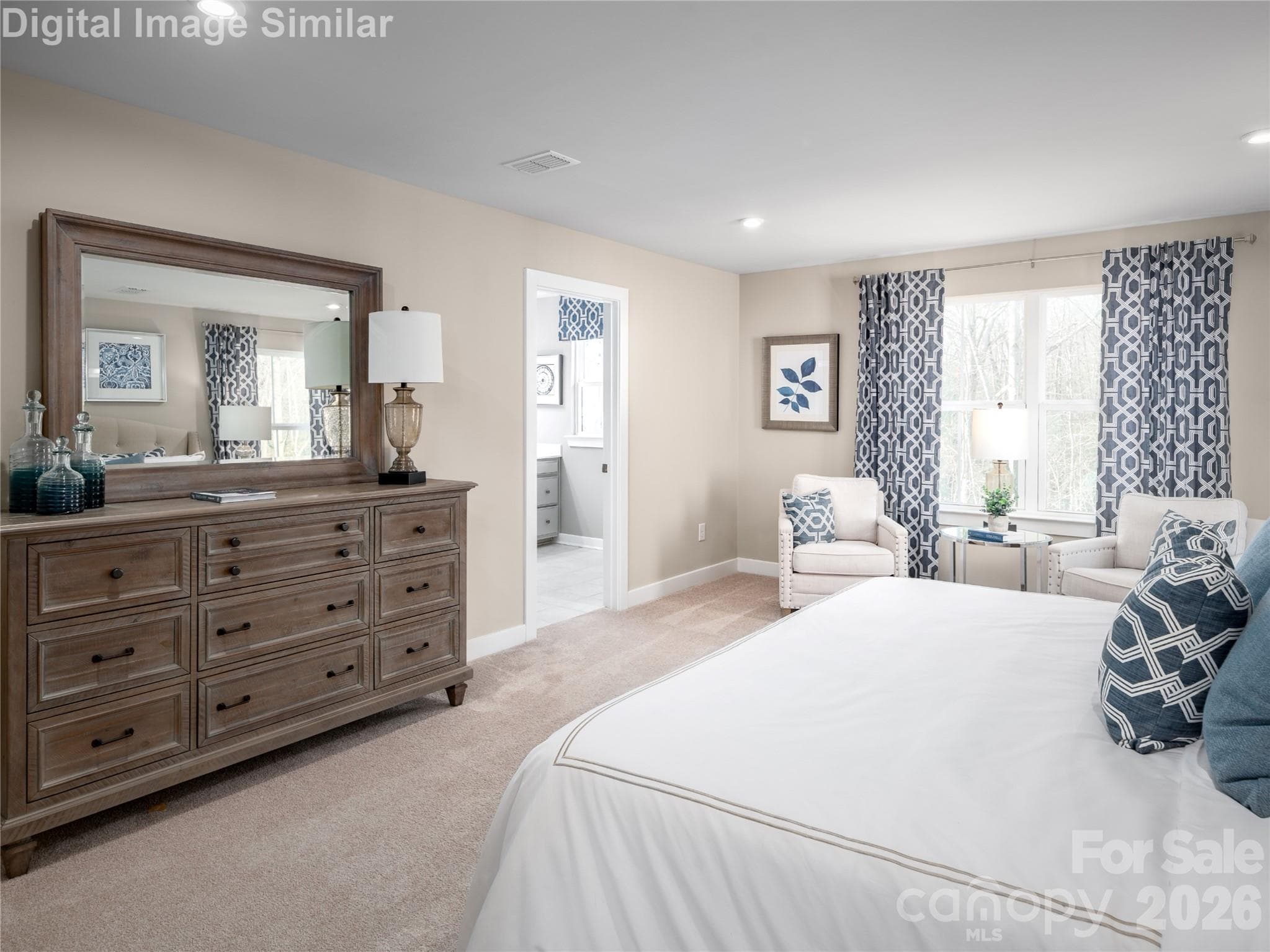 Plenty of room to relax and recharge — this bedroom offers space to move, unwind, and make it your own. - Charlotte