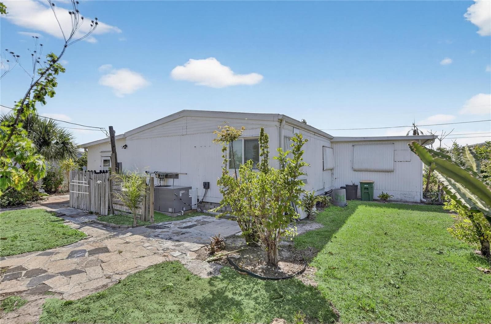Side of Subject Property - 1349 SEAGULL DR, ENGLEWOOD