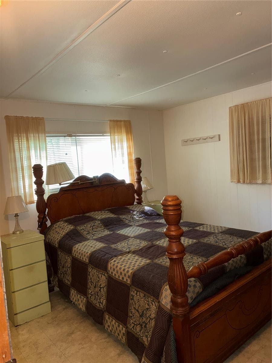 One of the bedrooms. - 24533 PINK PANTHER RD, PAISLEY