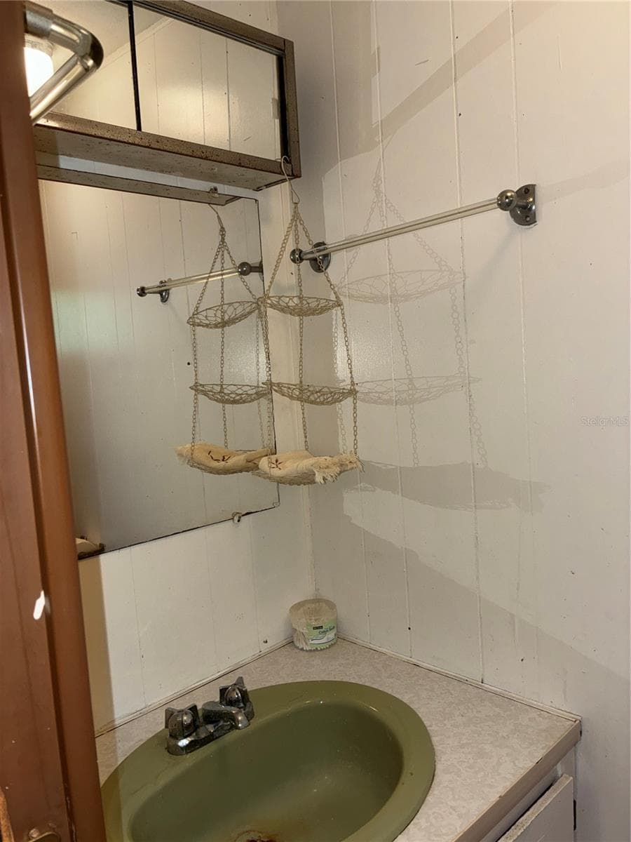 Additional view of half bath in the second bedroom. - 24533 PINK PANTHER RD, PAISLEY