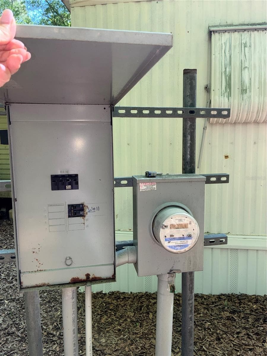 Electrical box and meter. Showing the secured cover which is only opened to power on or off. - 24533 PINK PANTHER RD, PAISLEY