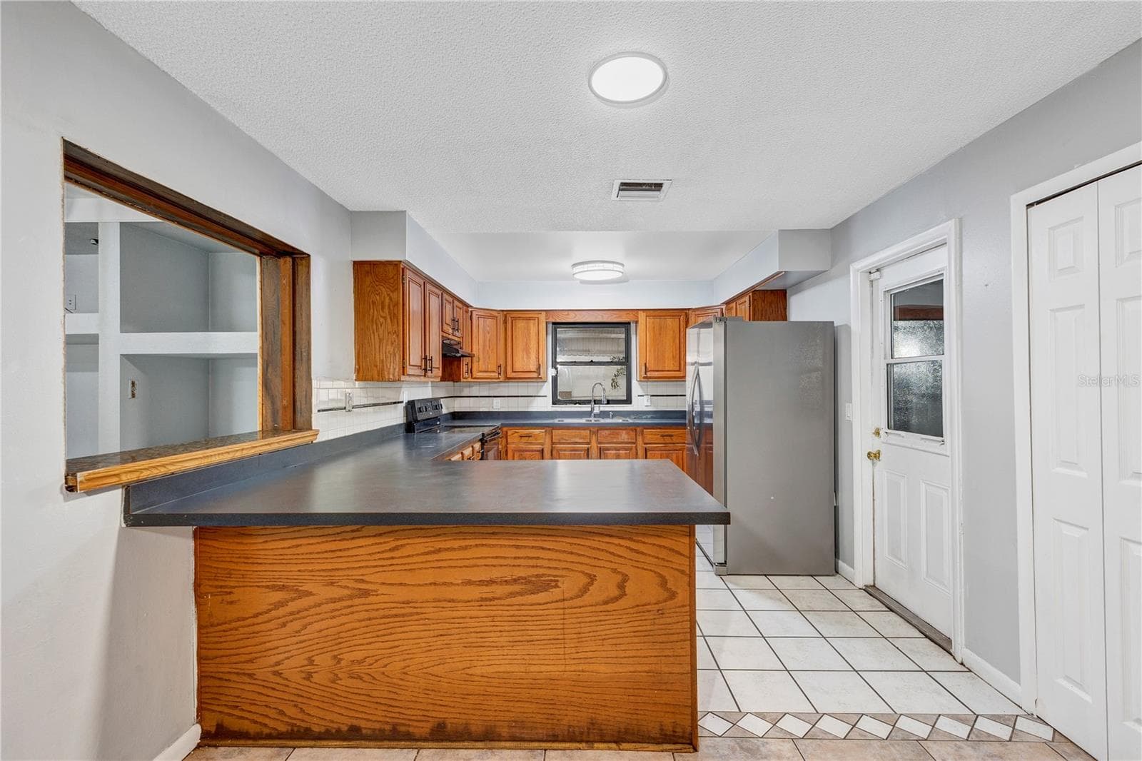 Single Family Residence at 7900 TOLEDO ST, ORLANDO, photo 10 of 32