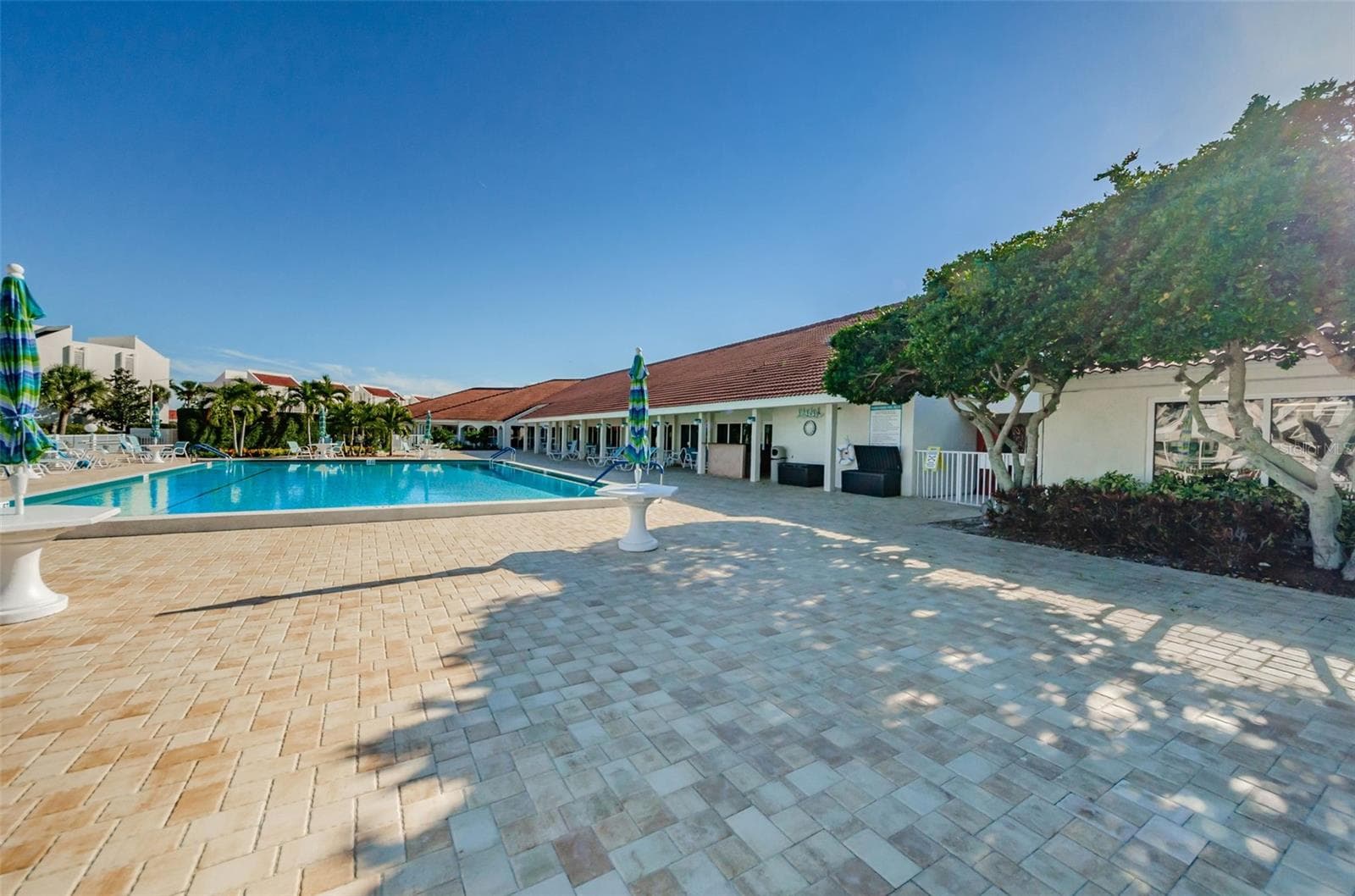Attractive Pavered Area surrounding the Clubhouse Pool - 7979 SAILBOAT KEY BLVD S #205, SOUTH PASADENA