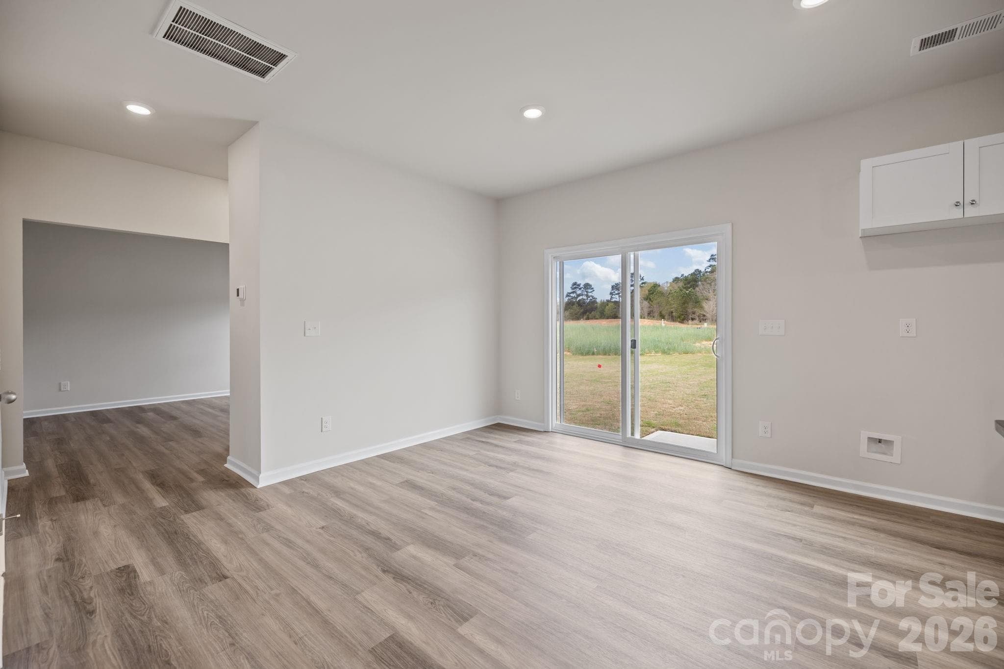 LVP flooring throughout the main floor. - 1253 Marble Passage, Richburg