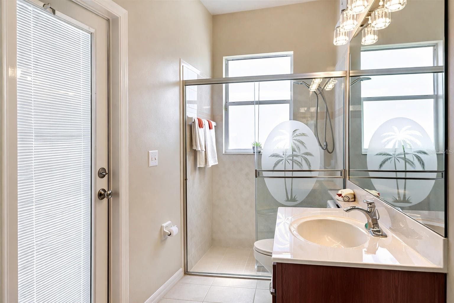 2nd Bathroom. AI Staged - 6002 RENAISSANCE CT, ST CLOUD