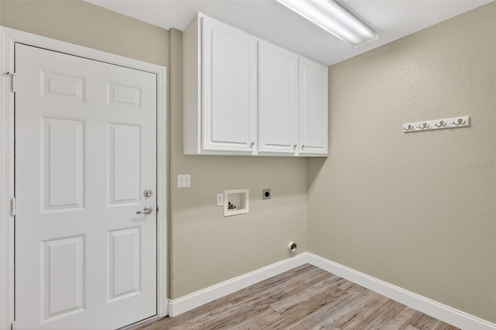 Laundry Room leading toward garage - 13811 SE 85TH CIR, SUMMERFIELD