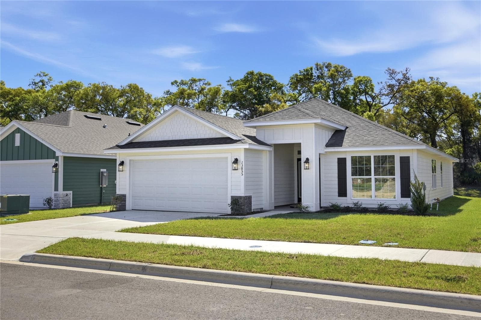 Photo Does Not Reflect Exact Color Finishes - 13634 NW 150TH CIR, ALACHUA