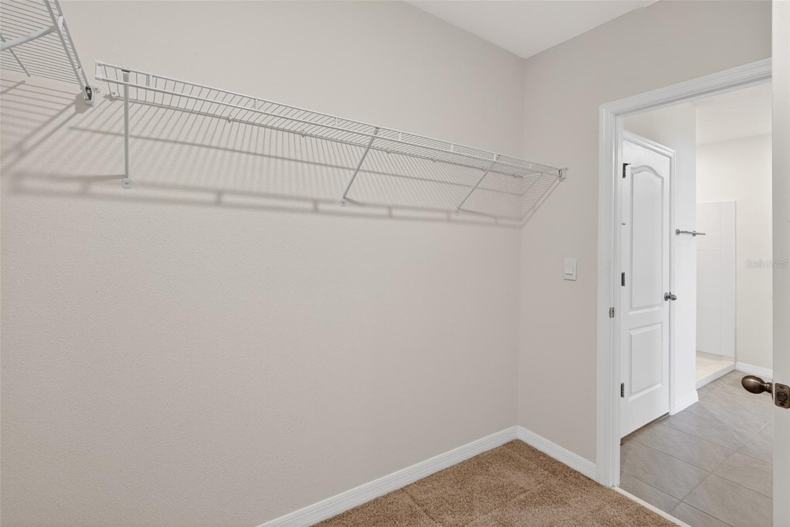 Primary closet - 1673 BARBERRY DR, KISSIMMEE