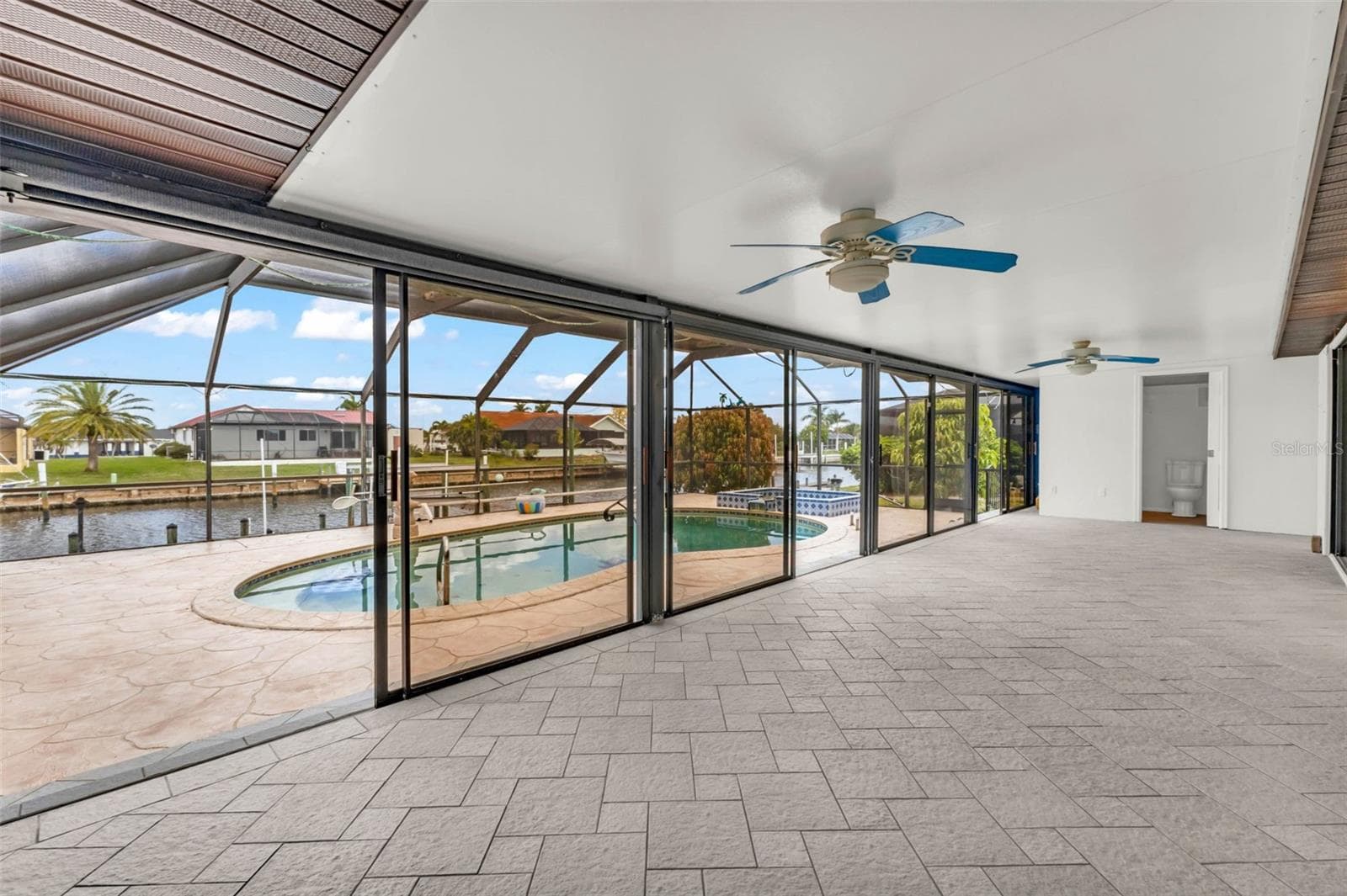 Huge enclosed lanai with a wall of sliders - 238 FRY TER SE, PORT CHARLOTTE
