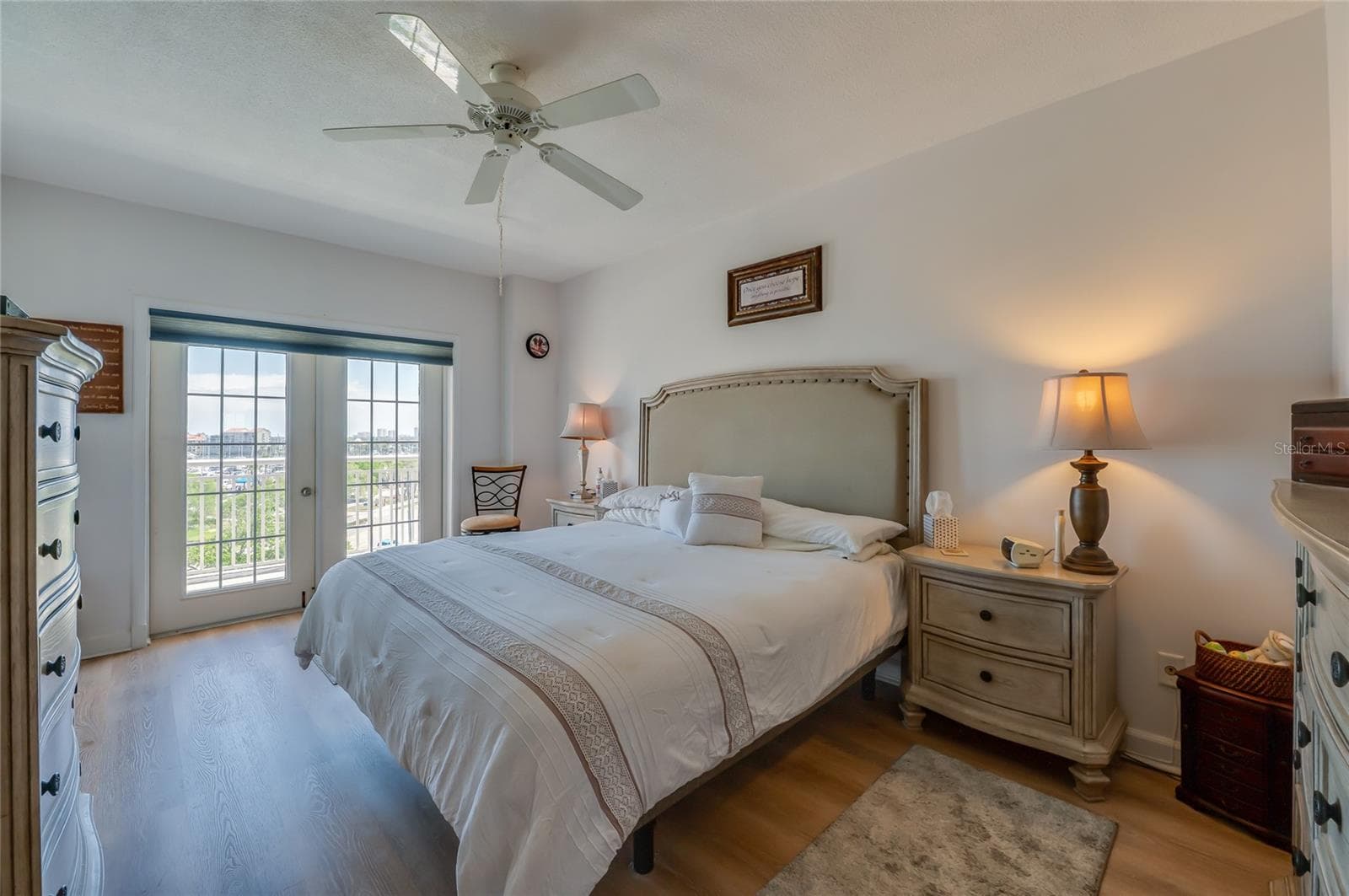 Primary bedroom with access to private balcony - 404 S BEACH ST #230 (604), DAYTONA BEACH