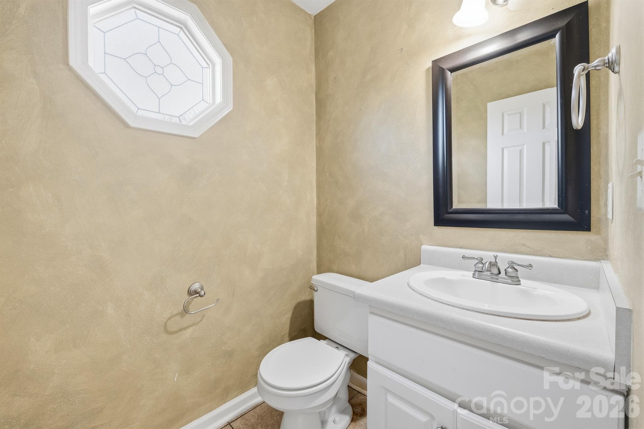 Half Bath on first floor - 5406 Winding Oak Drive, Hickory