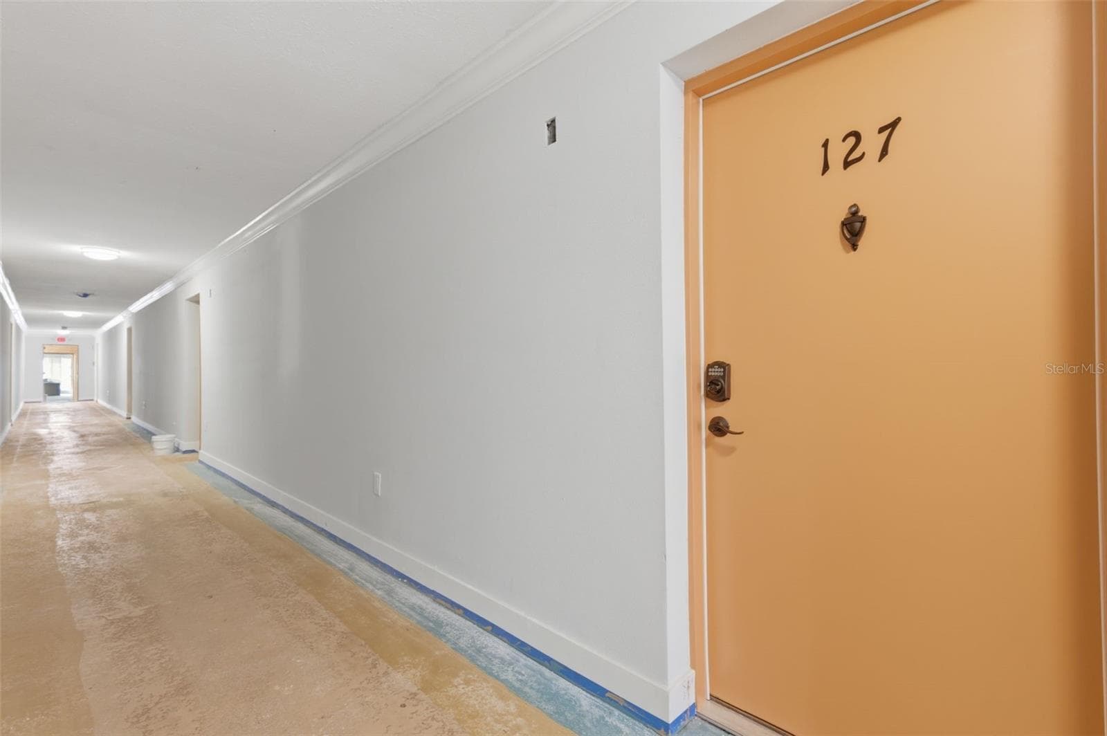 Hallway, which is currently being painted - 8901 BLIND PASS RD #127, ST PETE BEACH