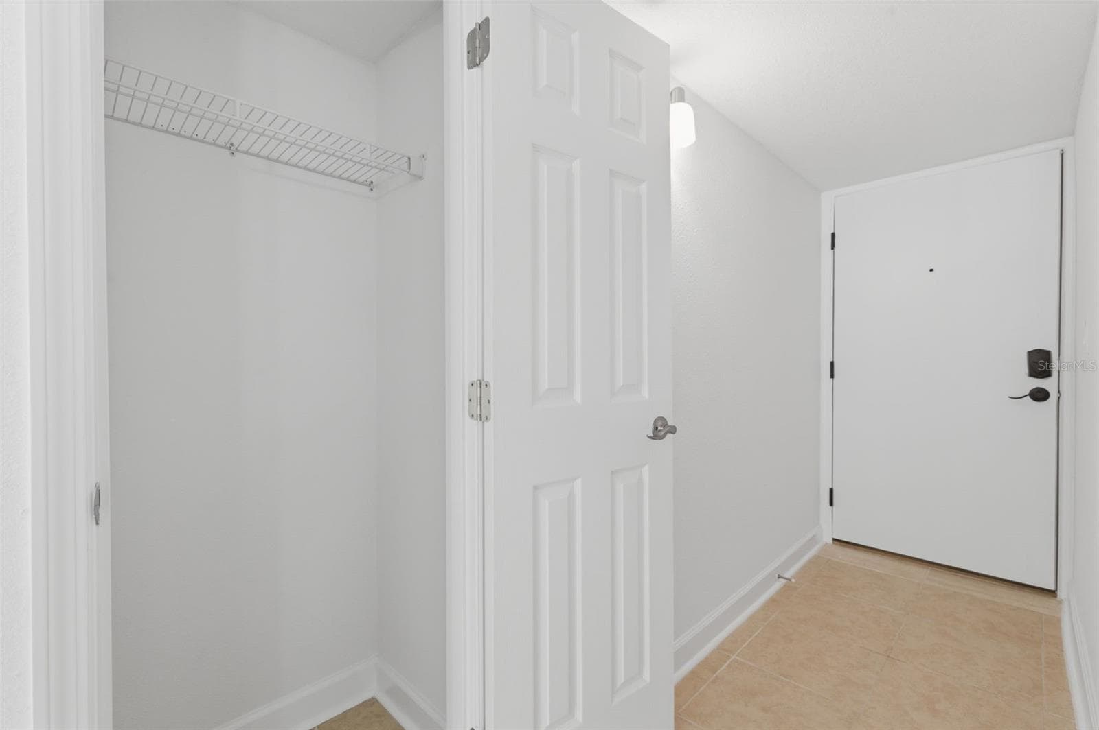 A nice coat closet in the hallway - 8901 BLIND PASS RD #127, ST PETE BEACH