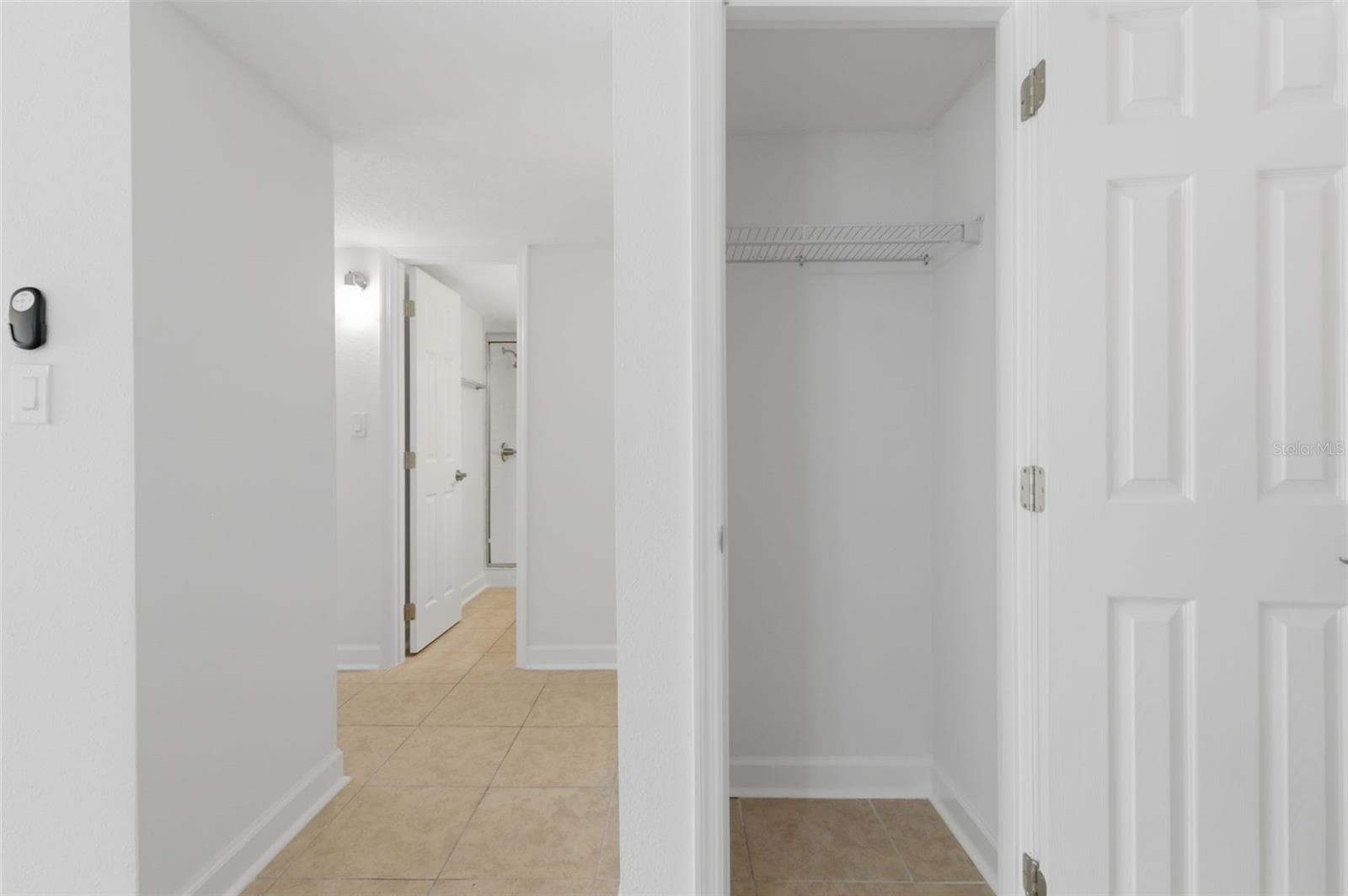 Hall closet in entry way - 8901 BLIND PASS RD #127, ST PETE BEACH