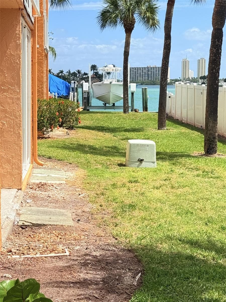 Take a short walk from the lanai down to the water - 8901 BLIND PASS RD #127, ST PETE BEACH
