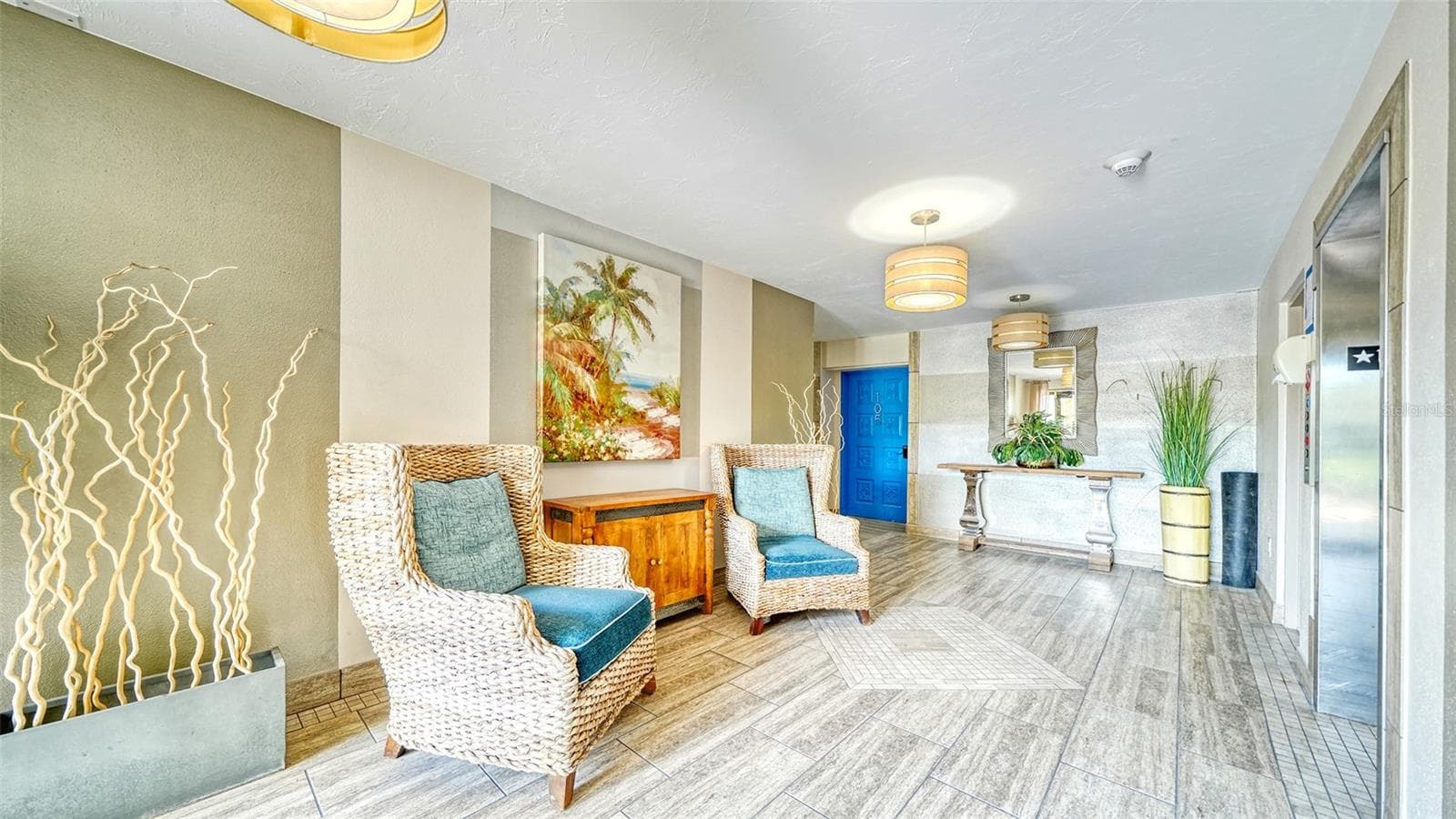 The remodeled lobby of 225 Hourglass Way and all of the floors have a nice coastal feel. - 225 HOURGLASS WAY #106, SARASOTA