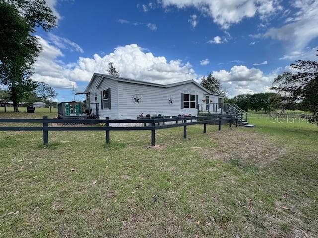 Front of home and small deck - 19231 NW HIGHWAY 335, WILLISTON