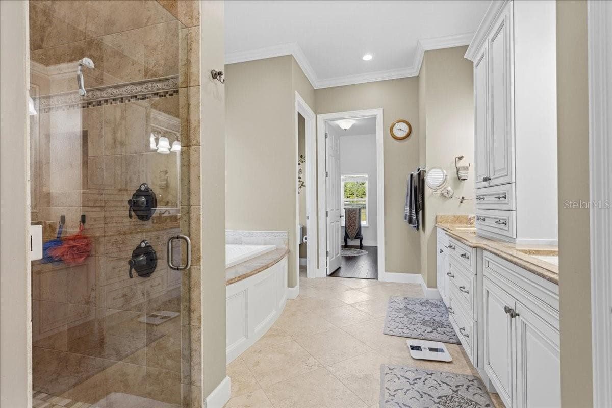 Primary bathroom en suite (downstairs) - 10401 NW 153RD TER, ALACHUA