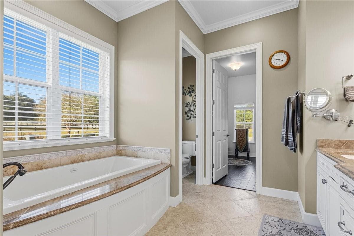 Primary bathroom en suite (downstairs) - 10401 NW 153RD TER, ALACHUA