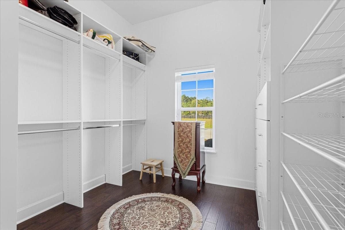 Primary bedroom walk-in closet - 10401 NW 153RD TER, ALACHUA