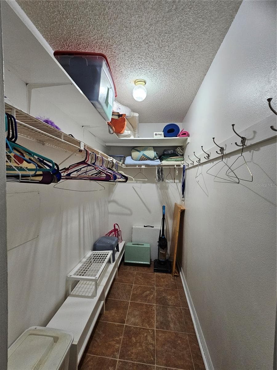 Walk-in Closet - 1905 CANTERBURY LN #E-9, SUN CITY CENTER