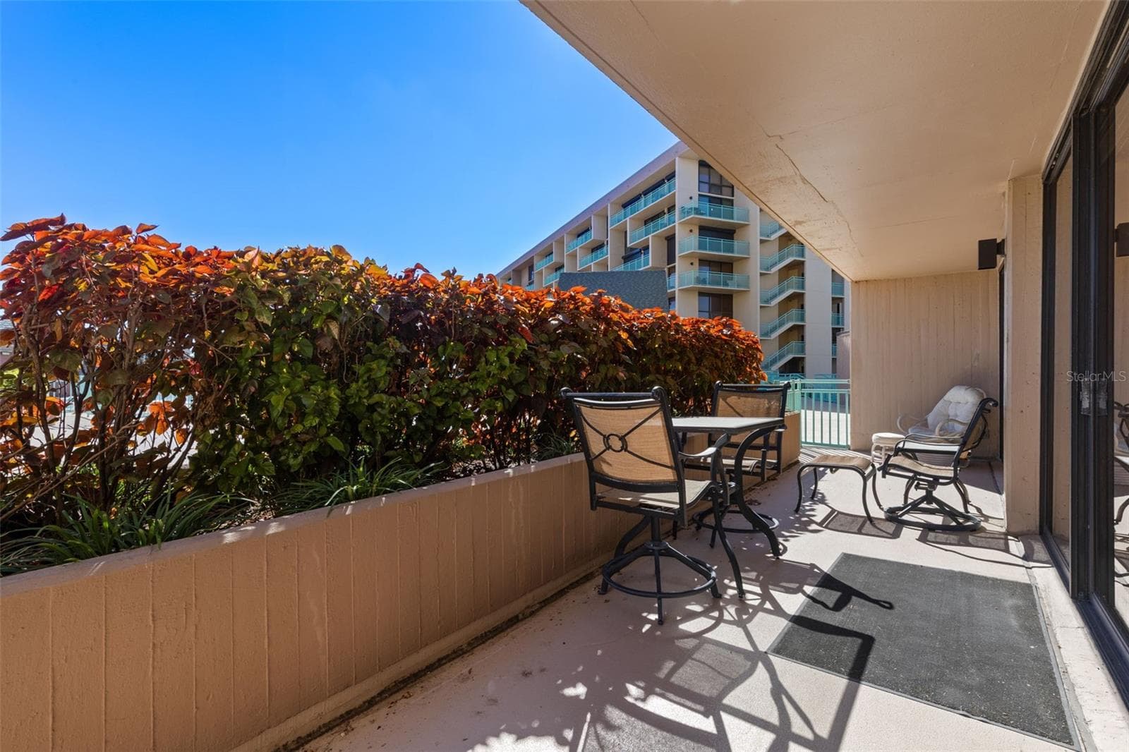 Private Terrace serves BOTH Bedrooms and Living Room - DIRECT access to POOL, Spa and Tiki Hut for Al Fresco Dining Options - 1 KEY CAPRI #102E, TREASURE ISLAND