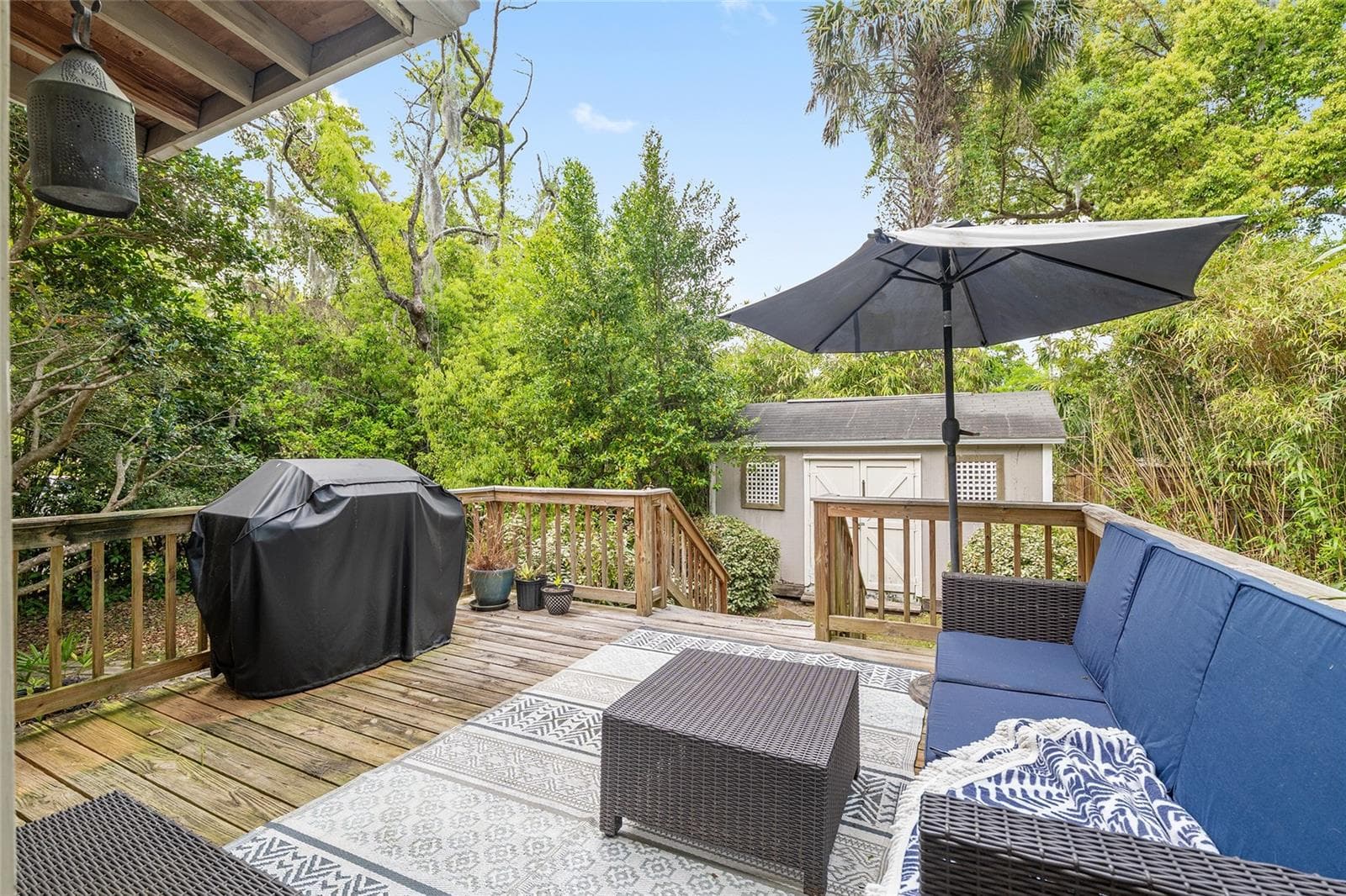 Deck overlooking backyard. - 721 SE 5TH ST, OCALA