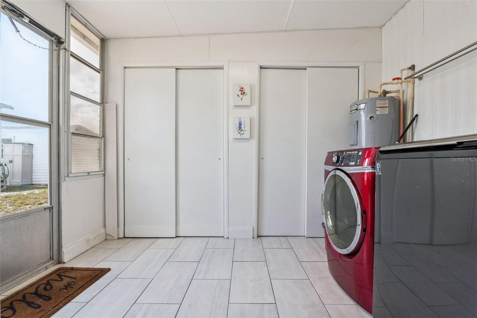 Laundry Room with Storage - 511 FLAMINGO LN, OSTEEN