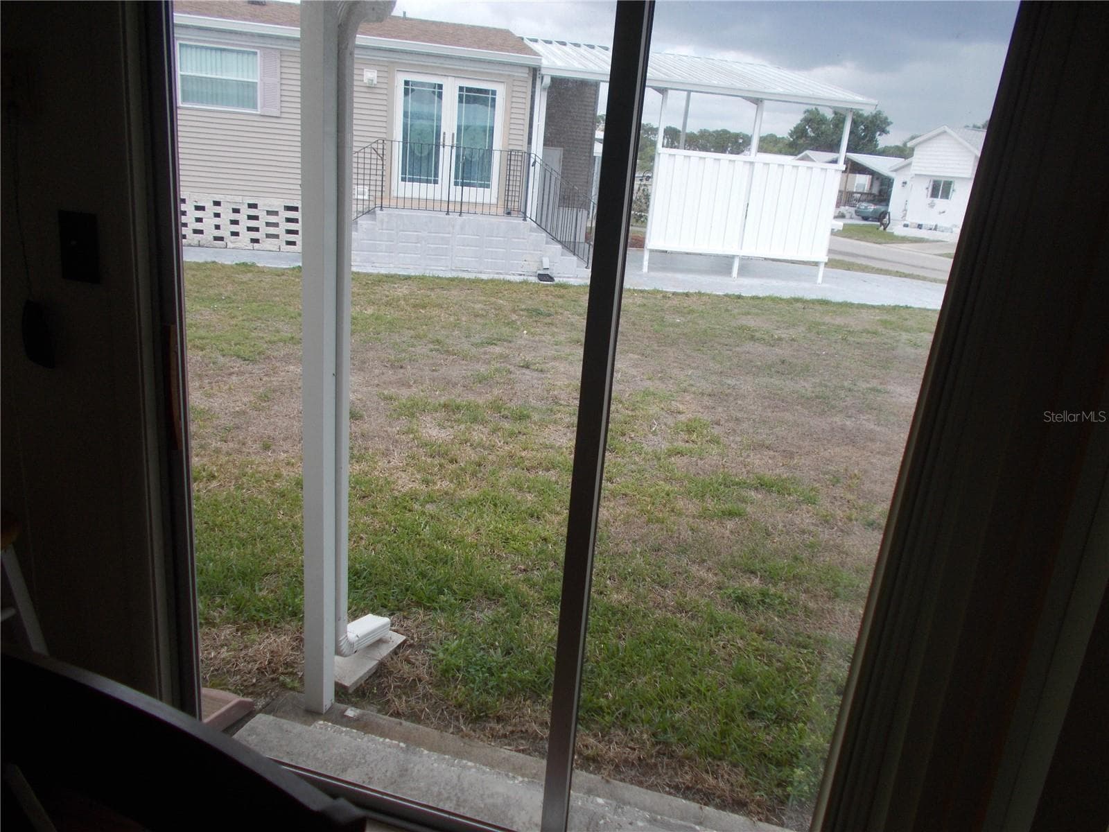 Slider from Dining Room to back - 6821 OCEAN CT, NORTH PORT