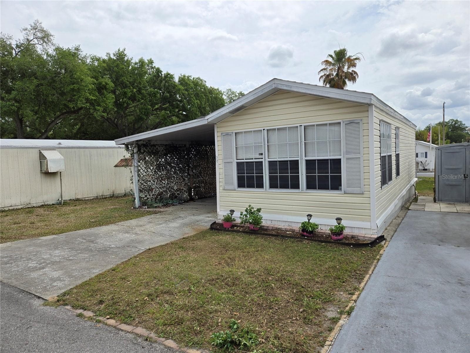 Manufactured Home at 39326 RECESS DR, ZEPHYRHILLS, photo 2 of 33