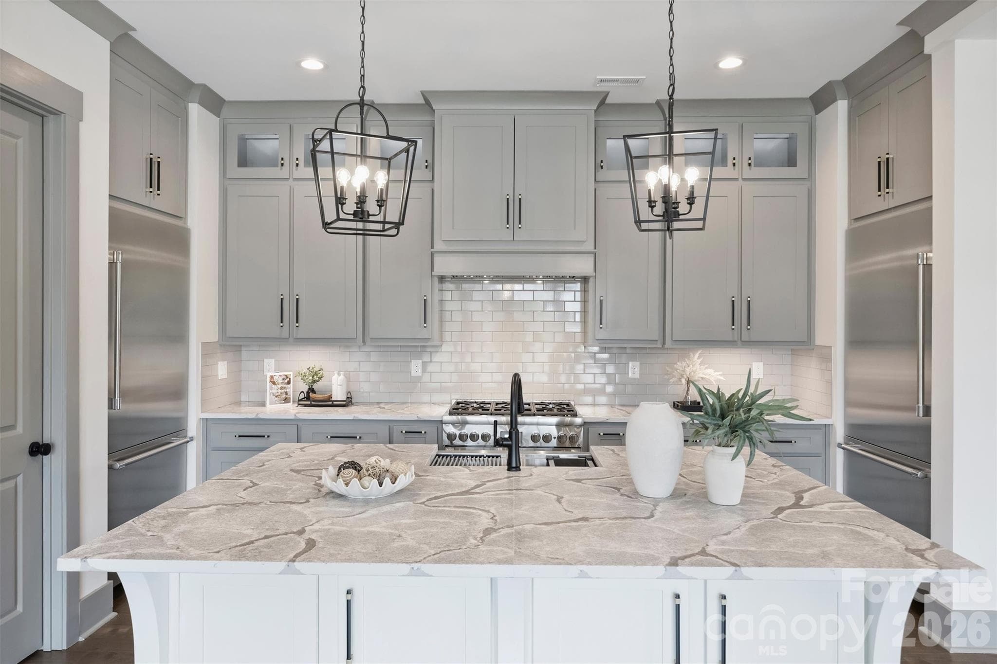 Oversized Island with Beautiful leathered Quartz countertops and Underneath Storage - 8159 Fairview Road, Charlotte