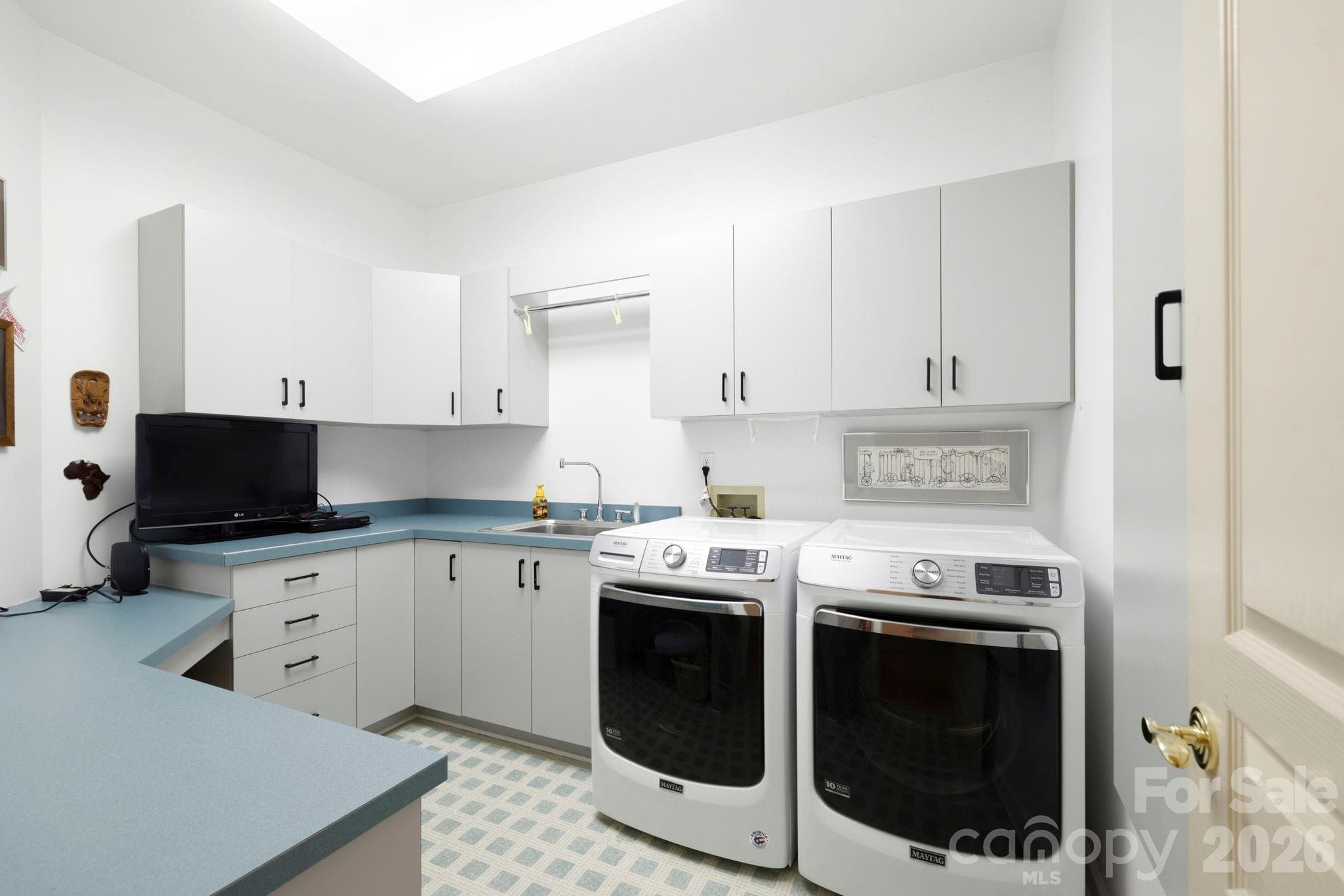Laundry room in hallway near bedrooms - 100 Elmridge Drive, Flat Rock