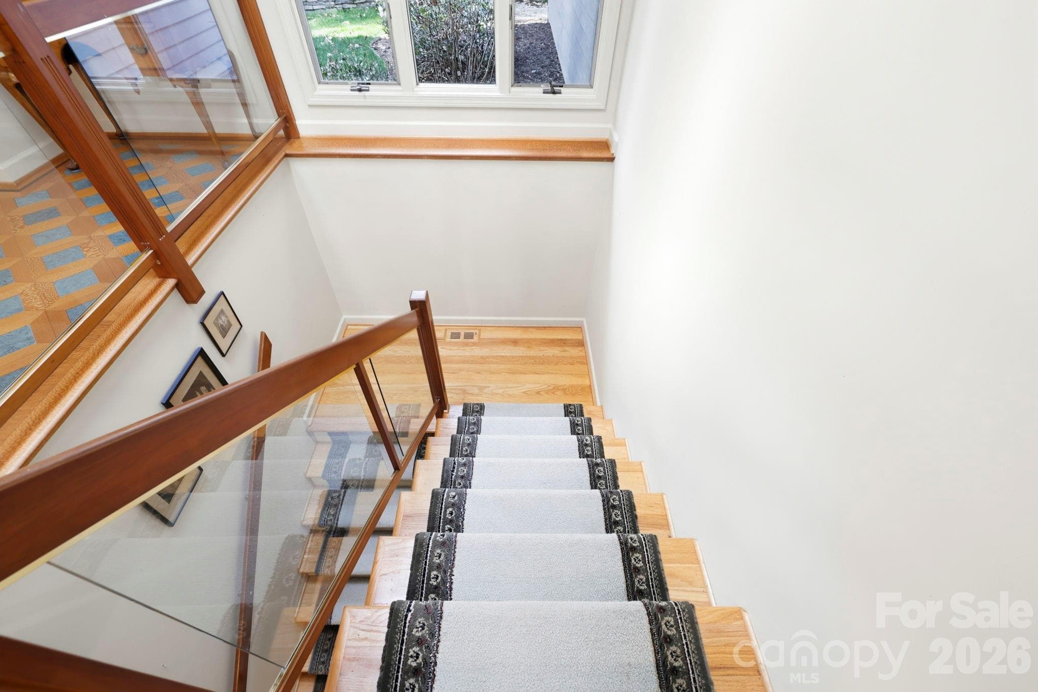 Stairs with glass railings - 100 Elmridge Drive, Flat Rock