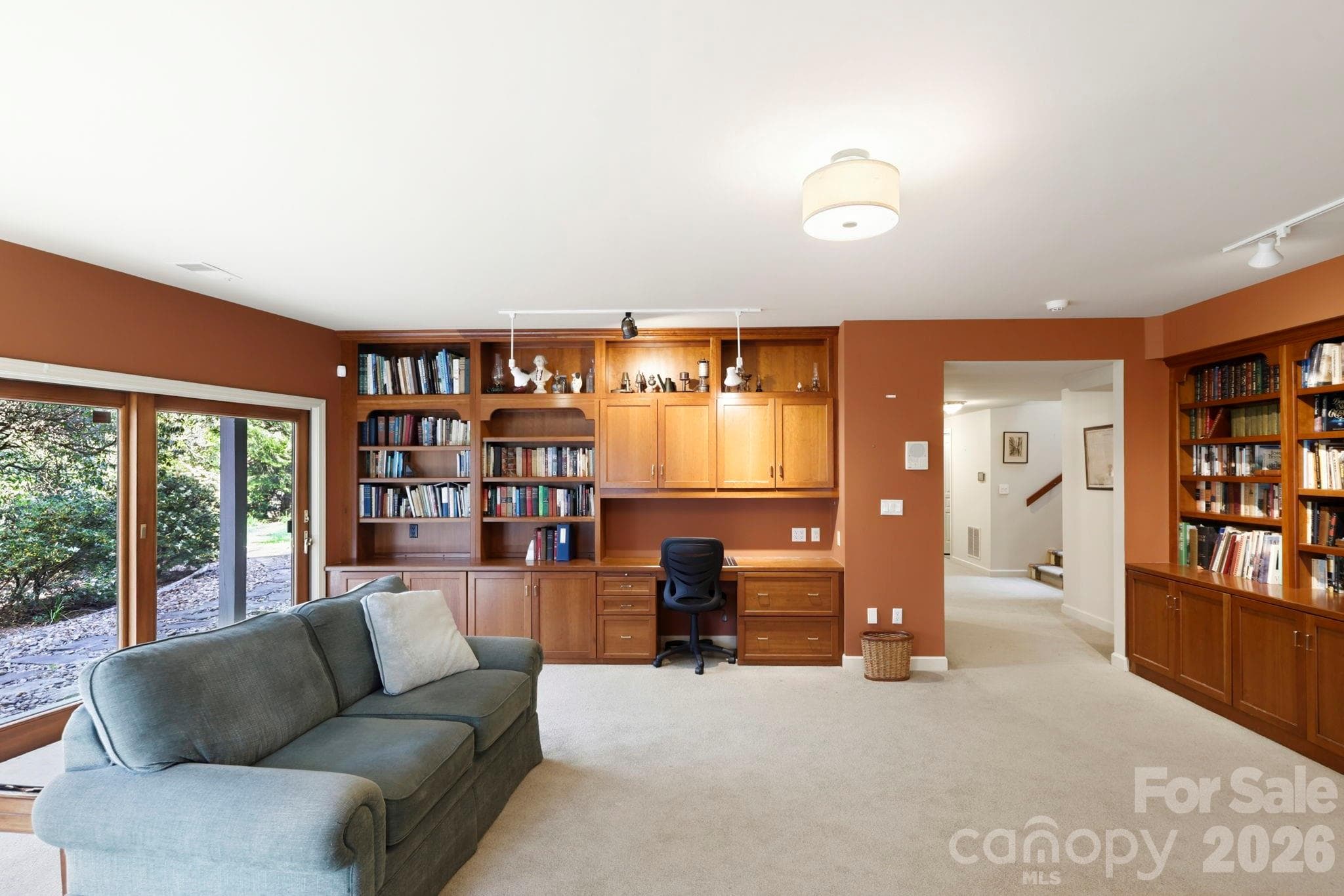 Large window overlooking patio and nature - 100 Elmridge Drive, Flat Rock