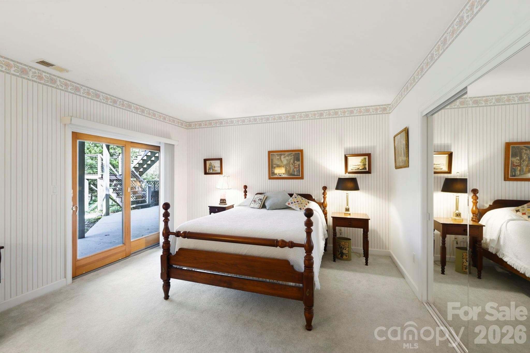 Third bedroom in lower level with access to back patio - 100 Elmridge Drive, Flat Rock