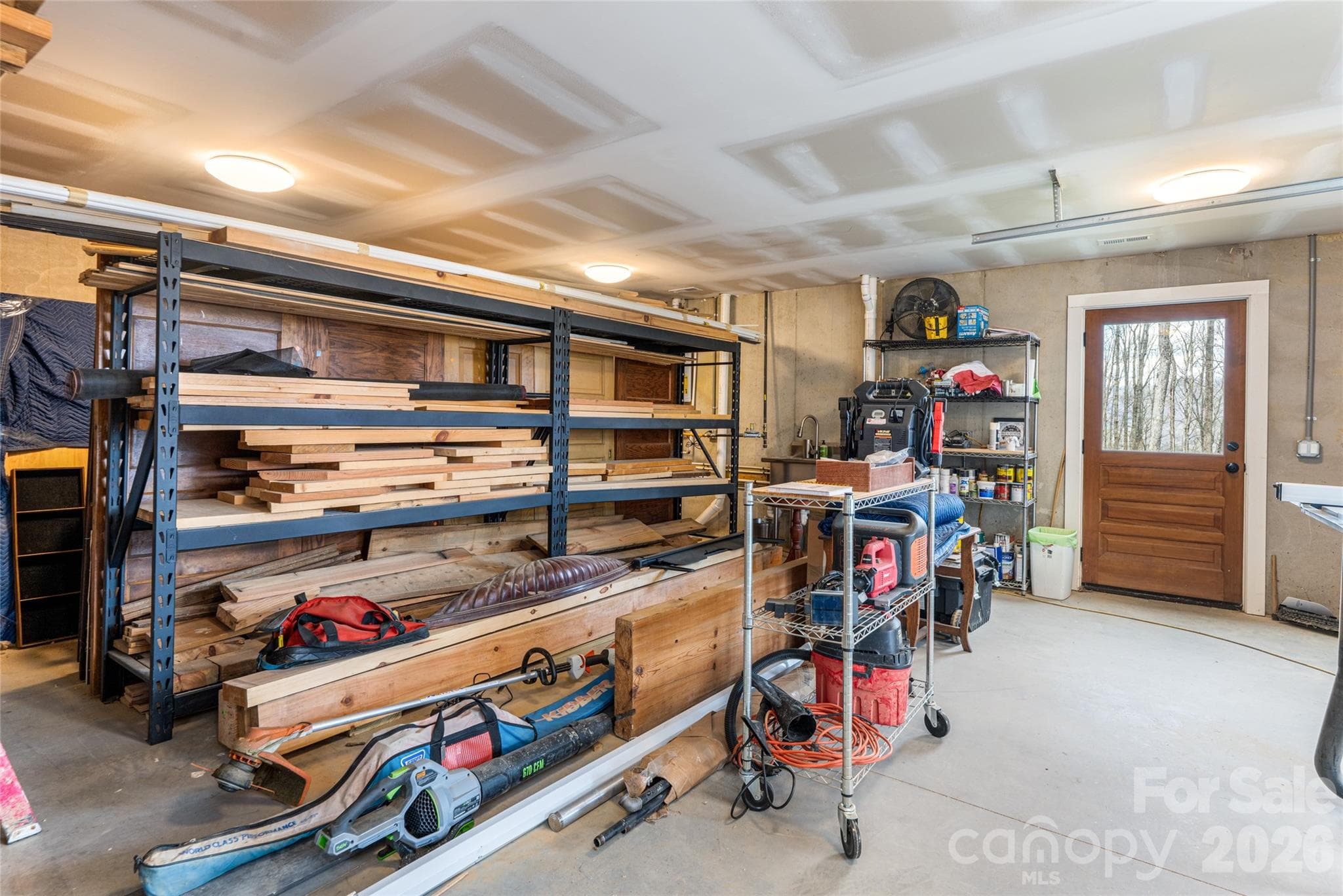 Workshop on lower level of garage - 51 Summit Road, Swannanoa